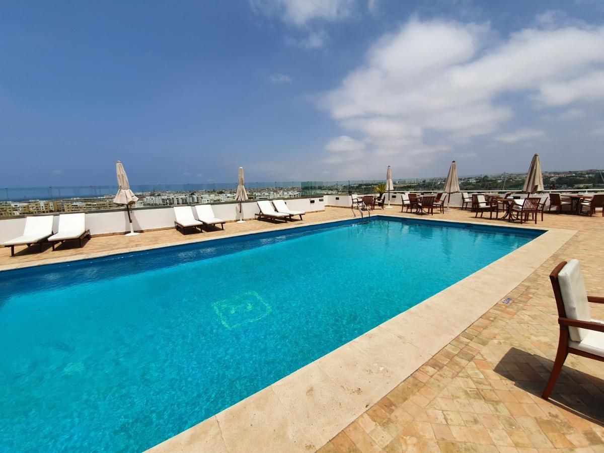 Hotel Borj Rabat - A Member Of Barcelo Hotel Group Exterior foto Rooftop pool at the hotel